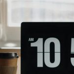 Home Office Essentials - Laptop and Coffee on Desk in Home Office