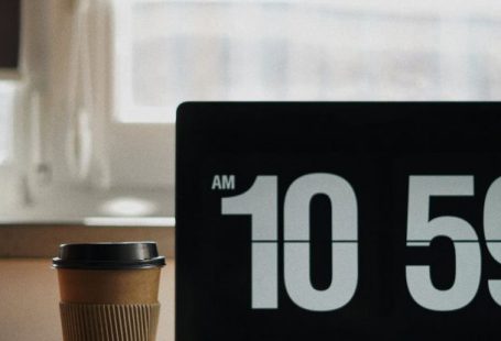 Home Office Essentials - Laptop and Coffee on Desk in Home Office