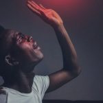 Influencer - Man in White Crew-neck Top Reaching for the Like