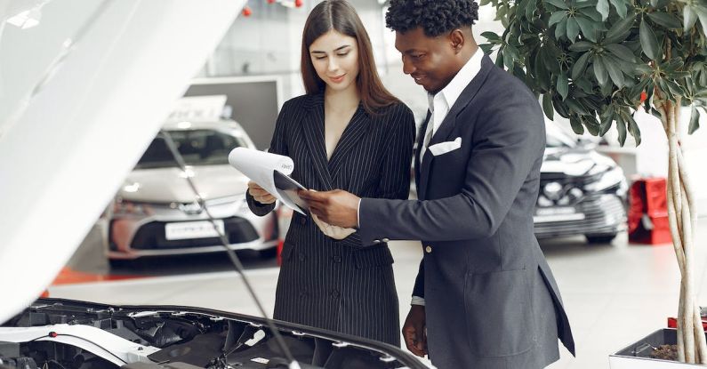 Customer Reviews - Businessman Looking at a Document