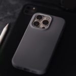 Tech Specs - A grey iphone 11 case sits on top of a table