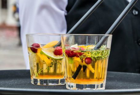 Subscription Services - 2 Whisky Glasses Filled With Beverage on Black Tray