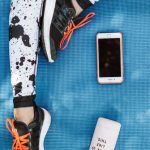 Smartphone - A Person's Legs on Yoga Mat