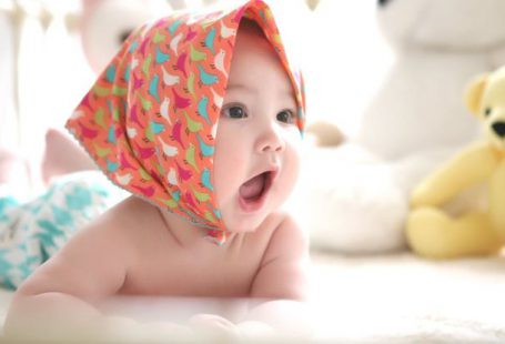 Baby Products - Toddler Wearing Head Scarf in Bed