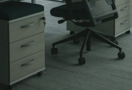 Ergonomic Chairs - Black Rolling Chair Inside the Office