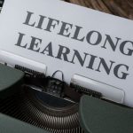 Lifespan - A typewriter with the word long life learning on it