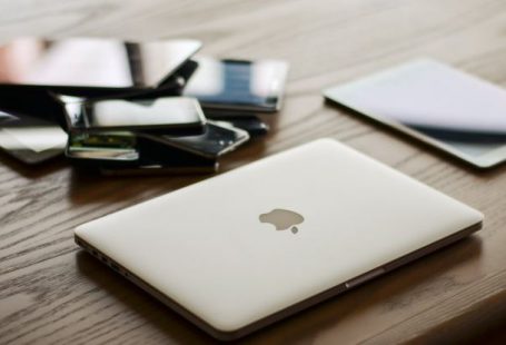 Mobile Phones - Macbook and Ipad on Desk